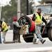 A crew of construction workers finish the East Stadium bridge on Tuesday. Daniel Brenner I AnnArbor.com